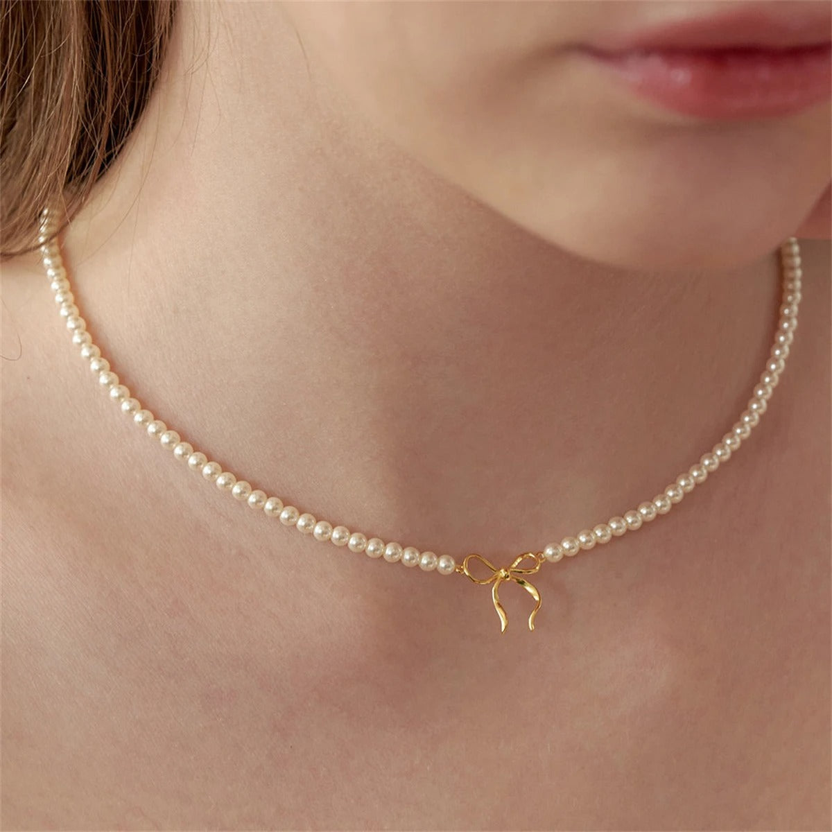 Elegant Beaded Pearl Bow Pendant Necklace – 18K Gold Plated
