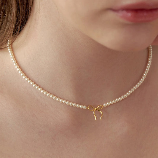 Elegant Beaded Pearl Bow Pendant Necklace – 18K Gold Plated